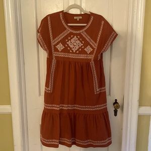 Cute Boho style flowy shirt dress with pockets!100% cotton. Brownish-rust color.